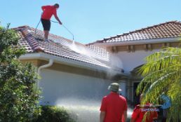 soft wash roof washing in progress on a home off of del prado blvd